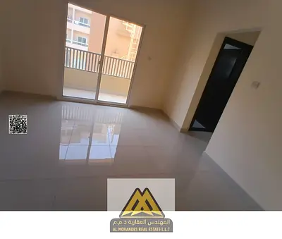 1-bedroom apartment with a hall in Al Rawda 1, first tenant, balcony, 2 bathrooms, central A/C, maintenance on landlord. AED 35,000 yearly, payable