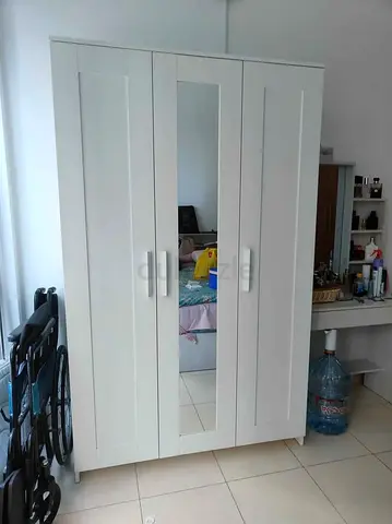 White 3-Door Wardrobe with Shelves and Hanging Rail - Good Condition