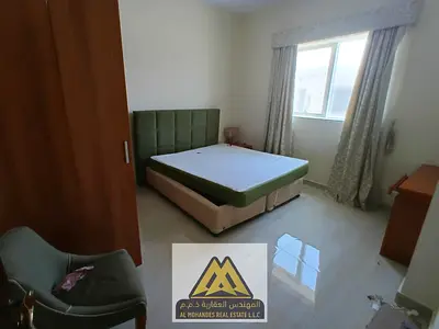 Two bedrooms and a living room with a balcony, fully furnished, and free internet in Al-Jarf 2 area, next to Al-Aqsa School and Delta Center.