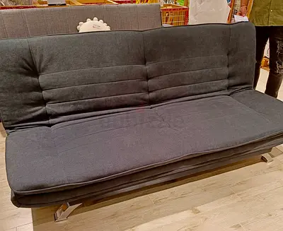 Dark grey fabric sofa bed / futon in good condition