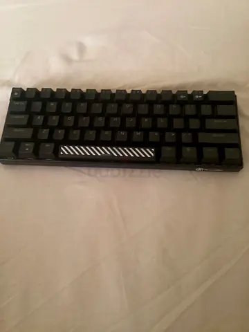 60% Mechanical Gaming Keyboard. No issues, just a slight crack on the side