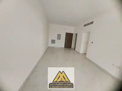 2 master bedrooms apartment in Al Yasmeen, 3 bathrooms, balcony, spacious layout, prime location near services.