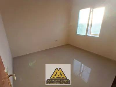 Two-bedroom apartment with a living room in Al Mowaihat 2, Ajman, 36,000 AED yearly, 6 payments, central AC, balcony, free maintenance, close to all s