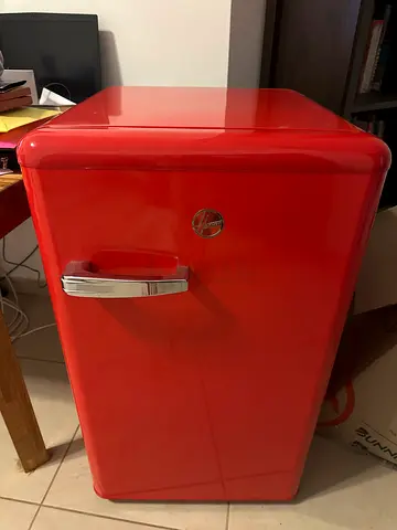 Stylish Hoover retro mini fridge with built-in freezer compartment.
