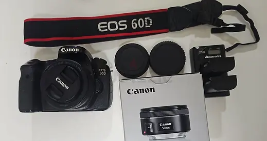 Canon 60d + 50mm 1.8 lense + 2battery and charger good condition