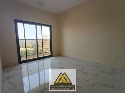 Two-bedroom apartment in Al Rawda 1, 3 bathrooms, central AC, AED 40,000 yearly, 4 installments, prime location.
