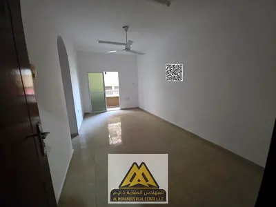 One bedroom and living room apartment for rent in Al Rumaila 1 – near Ajman Corniche, with a spacious layout and two balconies.