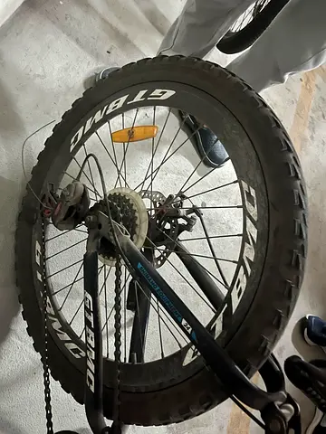 Used foldable bicycle rear wheel with gear cassette and disc brake