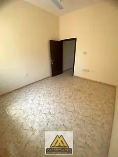 Annual studio for rent in Al Rawda 3, Ajman. Very spacious with a separate kitchen, split A/C, and f