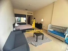 For annual furnished rent: Luxurious and elegant two-bedroom apartment with a living room, fully fur