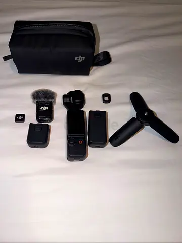 DJI Osmo Pocket 3 combo — case, batteries, tripod, mic ( Never used )
