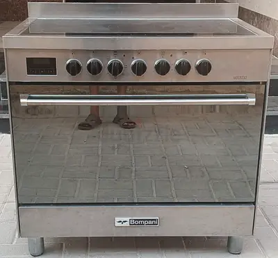 This Bompani Electric Cooker with 5 Hobs, size 90x60cm condition all Hobs oven are working good.