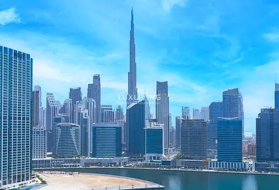 Burj Khalifa &amp; Canal View | Unfurnished | Vacant