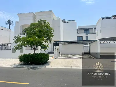 Luxury villa for rent in Ajmal Makan, Al Hamriya - Sharjah, 3 master BR, maid room, built-in wardrobes, spacious roof, central AC, modern finishes.