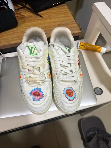 White sneakers with colorful embroidered floral design, gently used