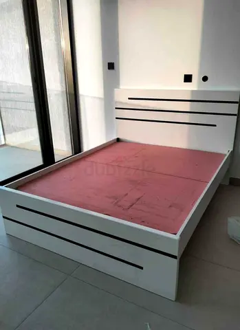 White wooden double bed frame with headboard - good condition
