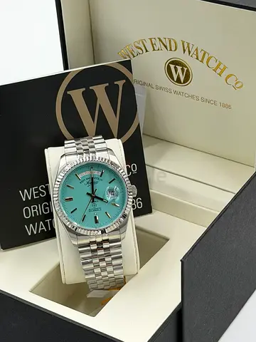 West End Watch Co. stainless steel mens watch with turquoise dial, full set