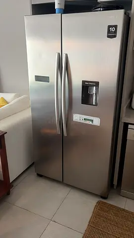 Samsung Stainless Steel Side-by-Side Refrigerator with Water Dispenser - Good Condition