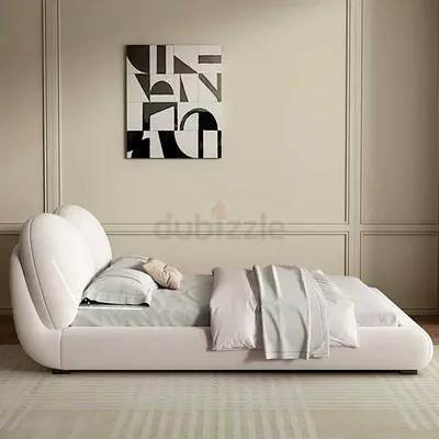 Low-profile modern upholstered double bed with curved headboard - white