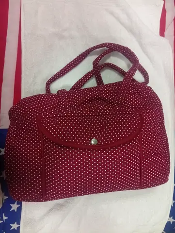 Maroon polka dot shoulder bag /baby bag with babyshop baby changing mat