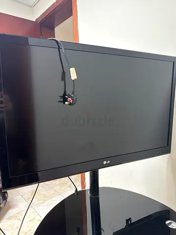LG 42-inch Flat Panel TV - Good Working Condition with table