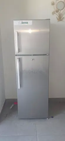 Silver Double-Door Refrigerator - Good Working Condition