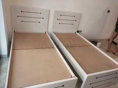 Pair of white single beds with headboards - good condition