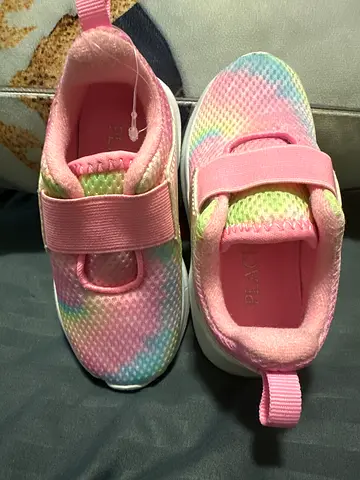 Pair of toddler pink rainbow slip-on sneakers, size 6 US toddlers