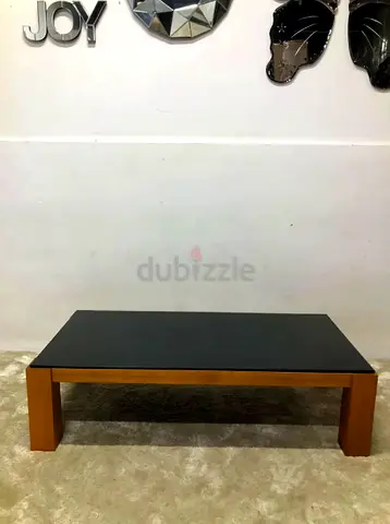 Coffee table with black glass