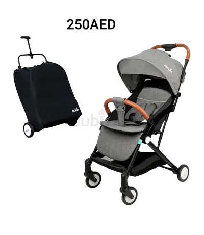 Lightweight grey baby stroller with adjustable canopy and reclining seat - 250 AED