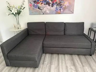 Grey L-shaped Fabric Sofa bed with Chaise - Good Condition
