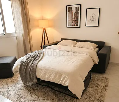 Modern 2-Seater Sofa Bed
Stylish 2-seater sofa bed with a modern dark grey fabric finish, comfortabl