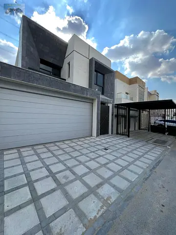 A unique opportunity to rent a luxurious, fully furnished villa in the Al Yasmin area, featuring a modern design, spacious areas, and equipped with ev
