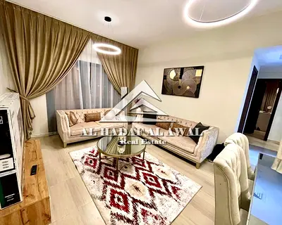 2 Bedrooms & Living Room for Rent in Al Khan Plaza Tower – Al Taawun