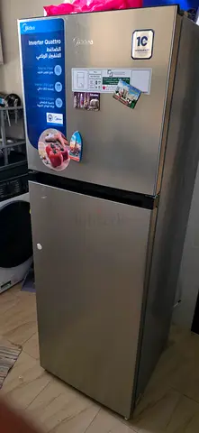 Used stainless steel refrigerator - single door freezer bottom, good condition