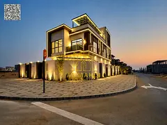 Luxury standalone villa for sale in Al Helio, Ajman. Includes registration fees, electricity, and wa