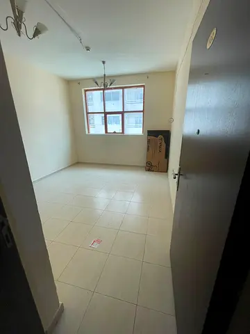 For annual rent: a spacious one-bedroom apartment (bedroom and living room) in Al Nabaa, available at the lowest price in Sharjah with payment in four