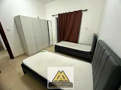 For annual rent: Two-bedroom apartment with a living room and balcony, central air conditioning, fre