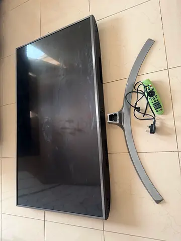 LG inch LED TV with curved stand and remote - good working condition