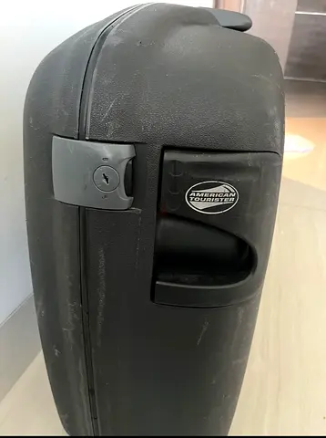 American Tourister  Hardshell Rolling Suit case Grey