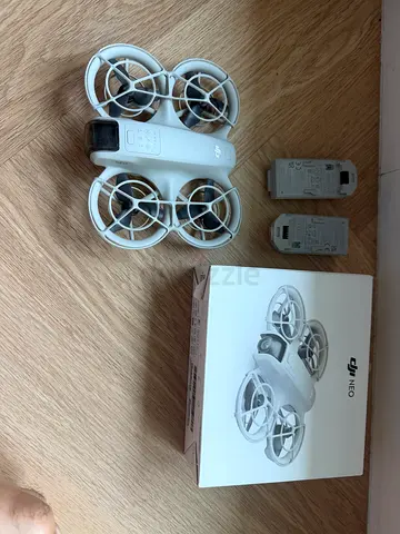 DJI Neo Drone with Propeller Guards and 2 Batteries, controller - Good Condition