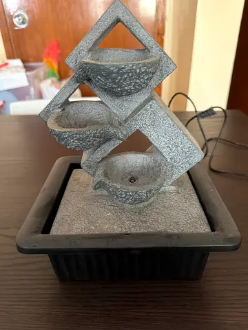 Small tabletop zen water fountain with geometric stone design