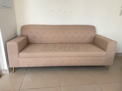 Beige 3-seater tufted sofa with gold legs - good condition