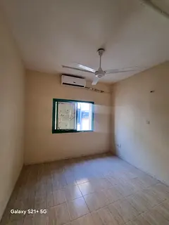 For rent in Al Nasserya, Sharjah: 2-bedroom apartment opposite the park, 1 bathroom, split AC, prime