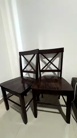 Set of 2 dark solid wood dining chairs with X-back design
