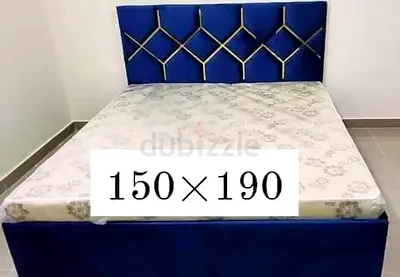 Blue upholstered double bed with mattress - 150 x 190 cm