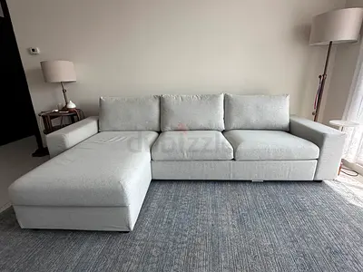 Light grey L-shaped sectional sofa with chaise - good condition