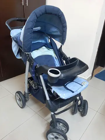 Used blue baby stroller/pram in good condition