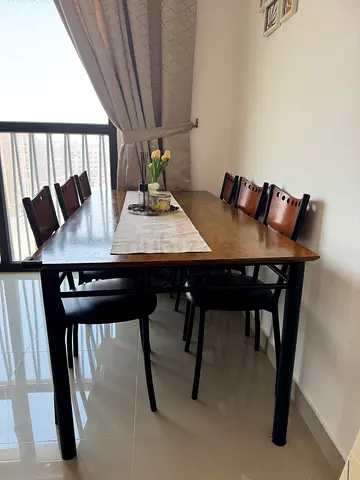 Solid wood dining table with 6 chairs - good condition 180 cmx90cm.small damages to two chairs