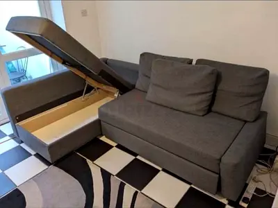 Grey 2-seater storage sofa bed - good condition